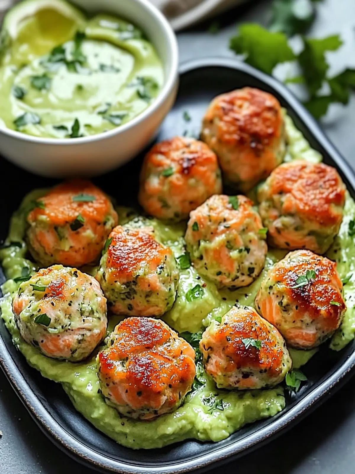 Baked Salmon Meatballs with Creamy Avocado Sauce You'll Love 2 Baked Salmon Meatballs with Creamy Avocado Sauce